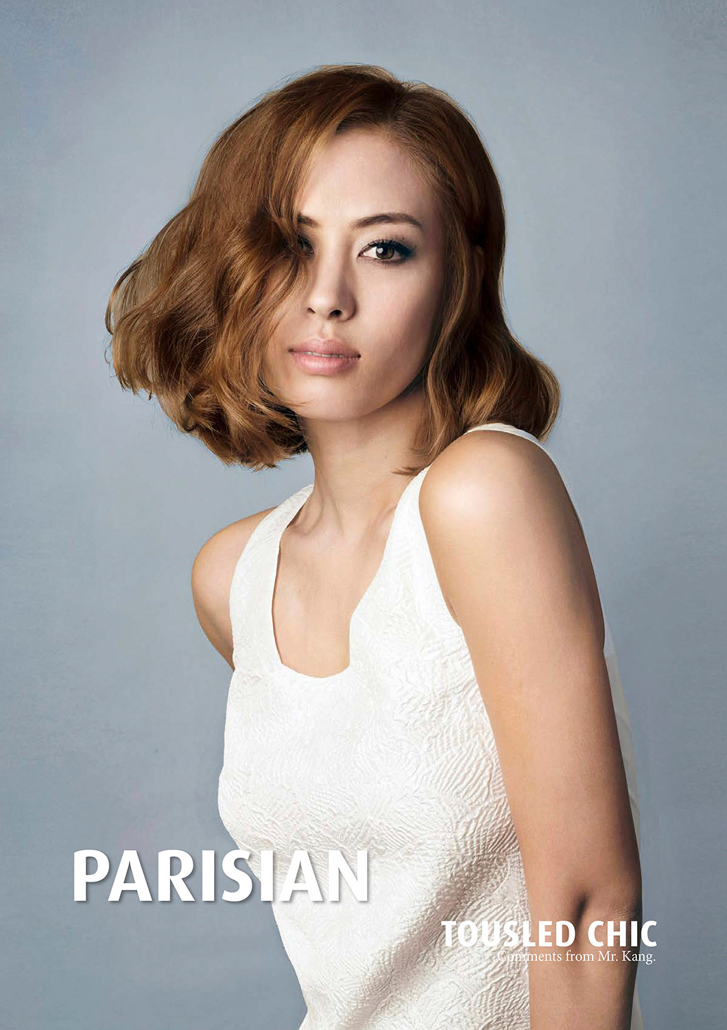 Commercial haircare photography services Tousled Chic, a hairstyle from the L'Oreal hairstyles collection lookbook, masterfully captured as part of commercial haircare photography services.