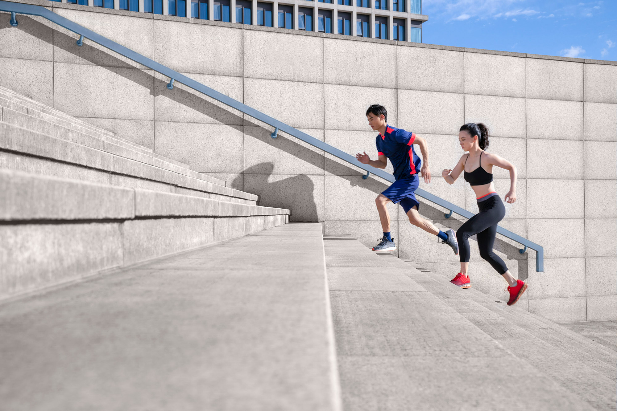Commercial fitness photography services Westin fitness and wellness campaign, featuring two joggers ascending a set of stairs, perfectly showcasing the commitment to an active lifestyle through commercial fitness photography services.