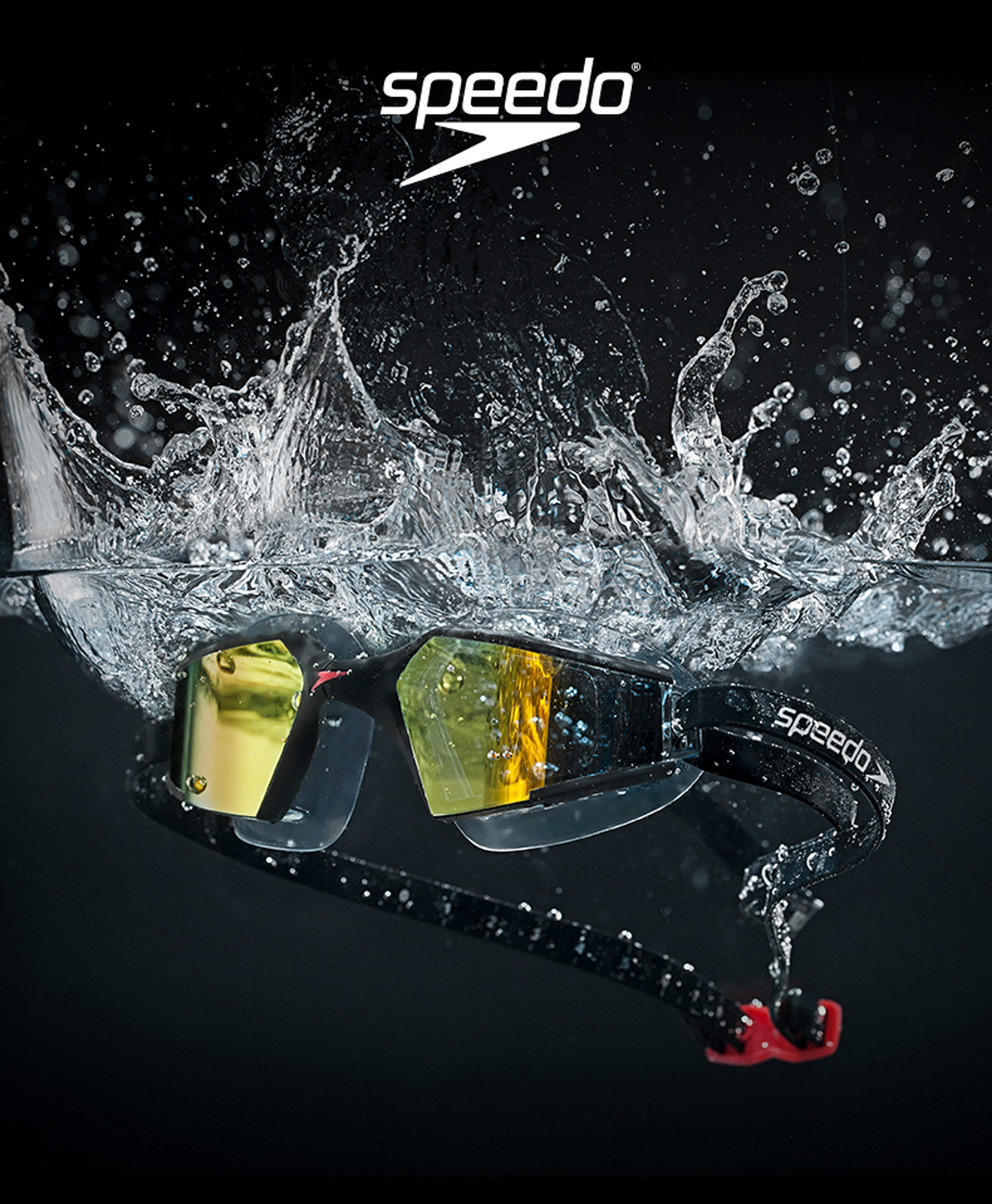 Commercial product photography services Speedo goggles splashing into the water, captured as part of commercial product photography services.