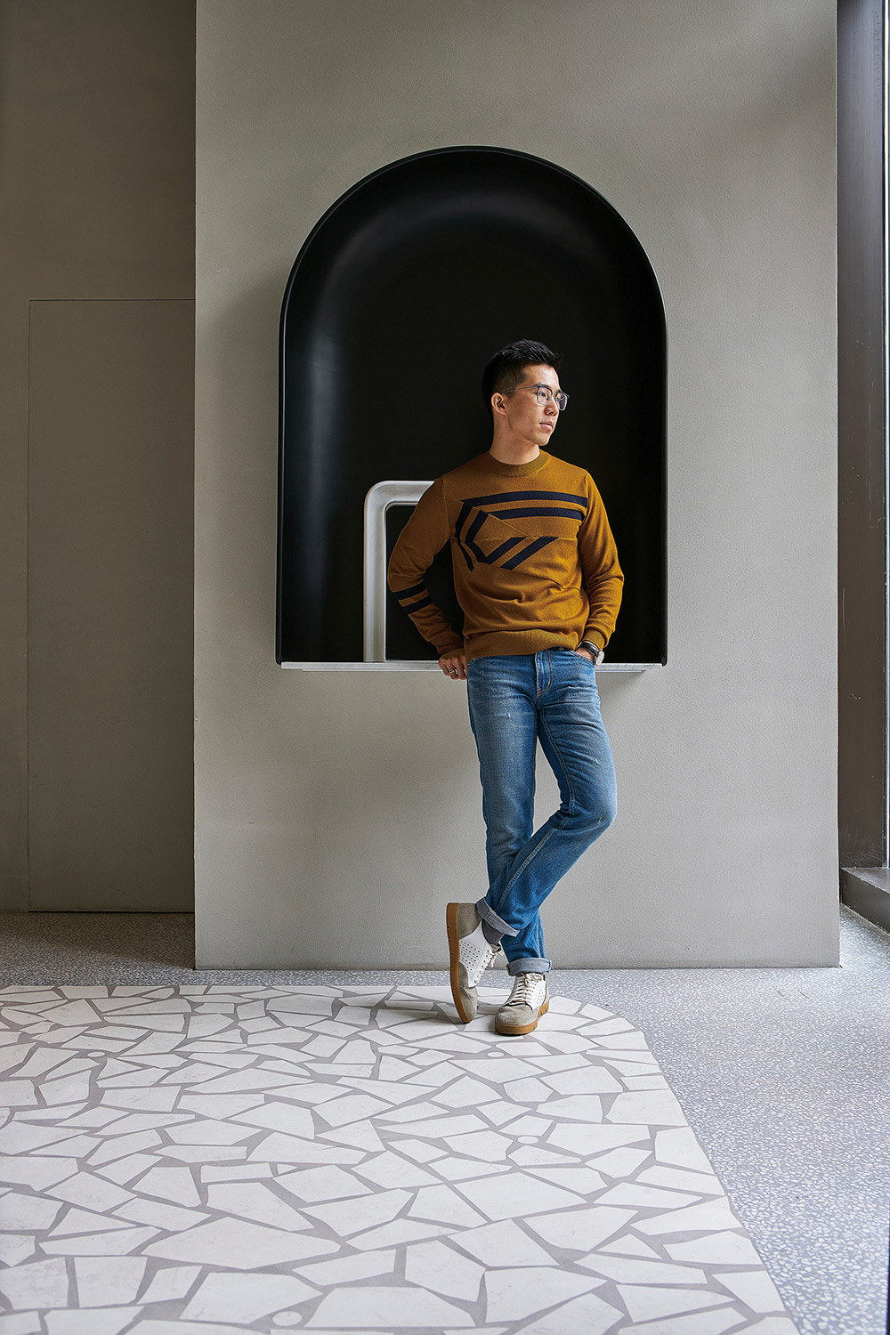 Corporate Portrait Photography Services A restaurant owner poses inside of his establishment for a portrait published in ELLE Decor, as part of our corporate portrait photography services.