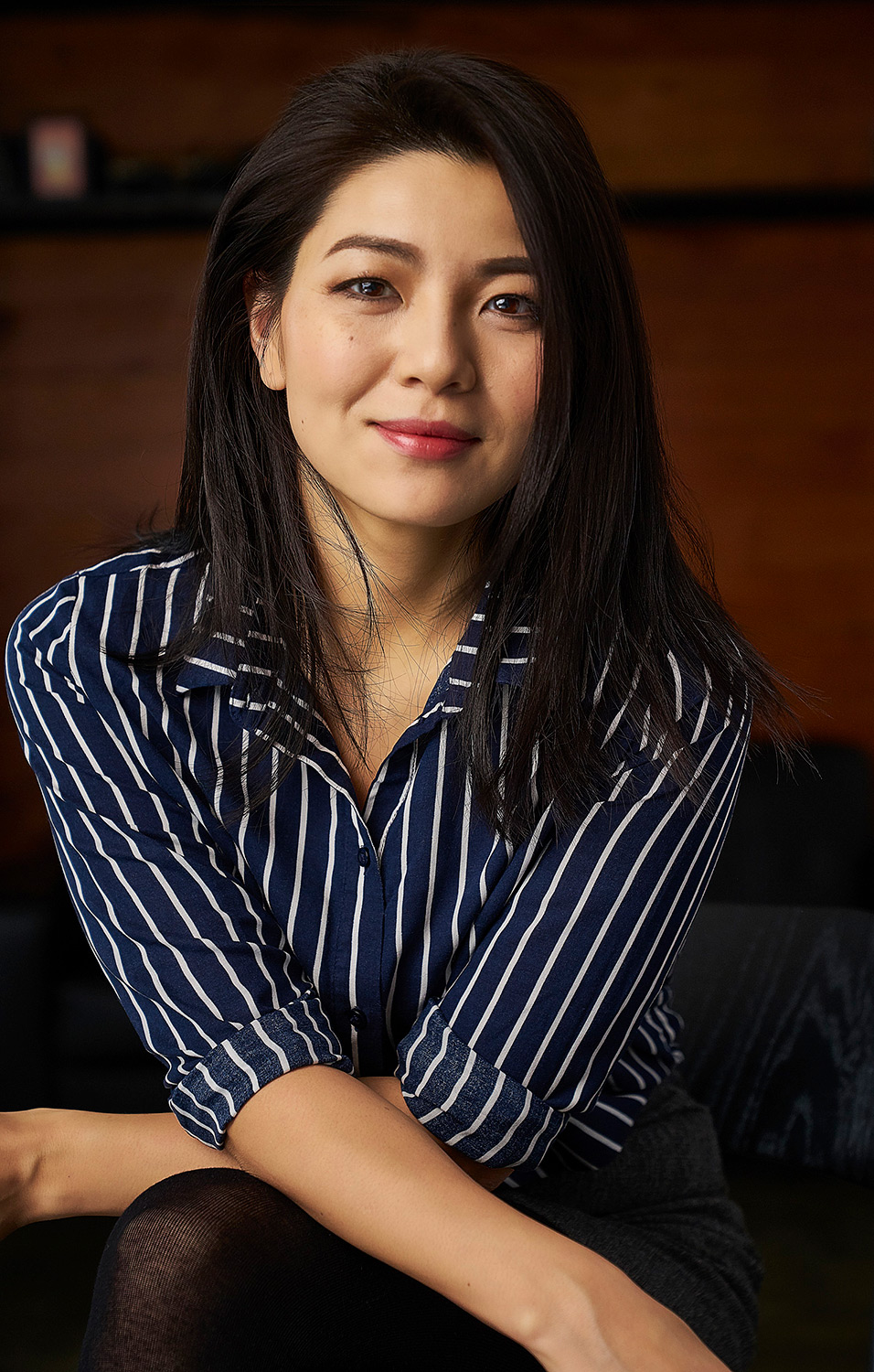 Corporate Portrait Photography Services As part of a corporate portrait photography campaign, the Marketing VP poses for a portrait.