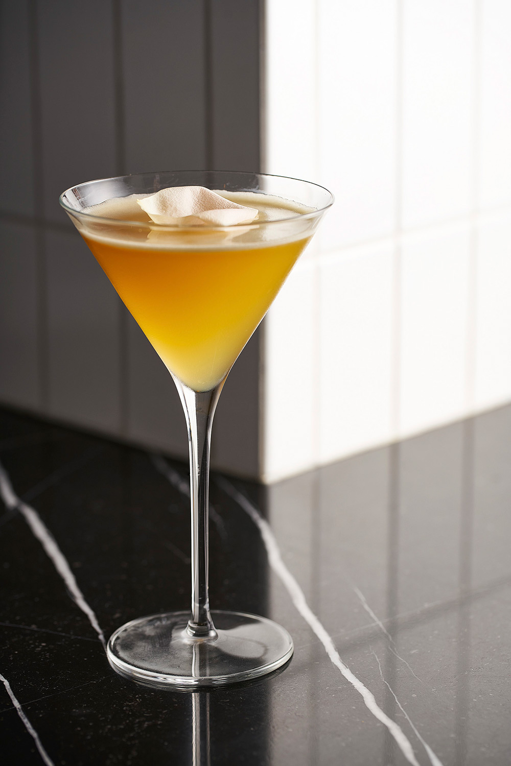 Hotel and hospitality drink photography services An enticing apricot cocktail drink, part of a hotel and hospitality drink photography campaign.