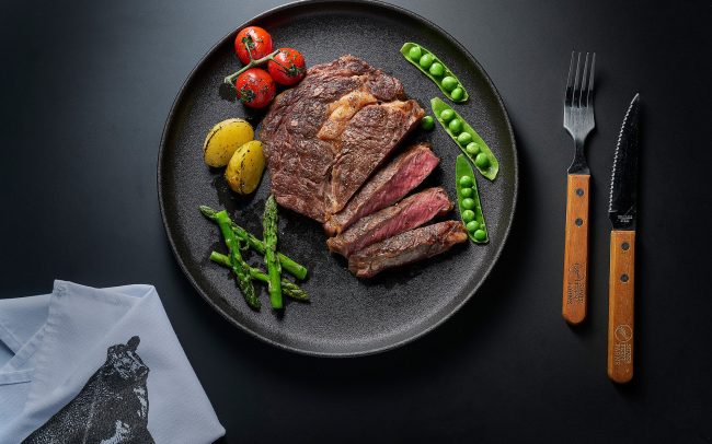 Image featuring a delectable ribeye steak from Silver Fern Farms, captured in a hotel and hospitality food photography campaign.