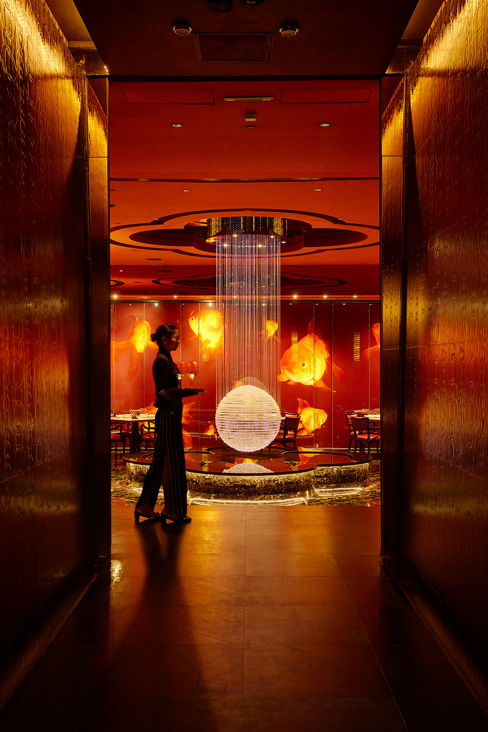 Hotel and hospitality staff photography services Service staff delivering drinks to guests in a Michelin star restaurant, captured for a hotel and hospitality staff photography campaign.