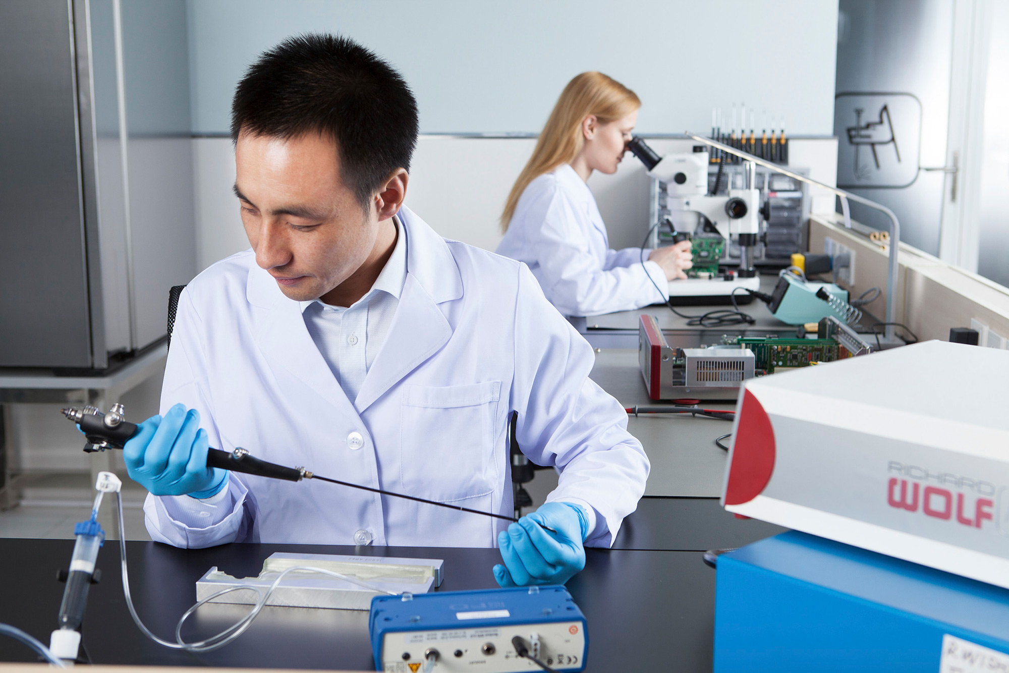 Science Photography Scientists conducting experiments in the lab at Richard Wolf's Shanghai R&D center, representing our expertise in science and technology photography services.
