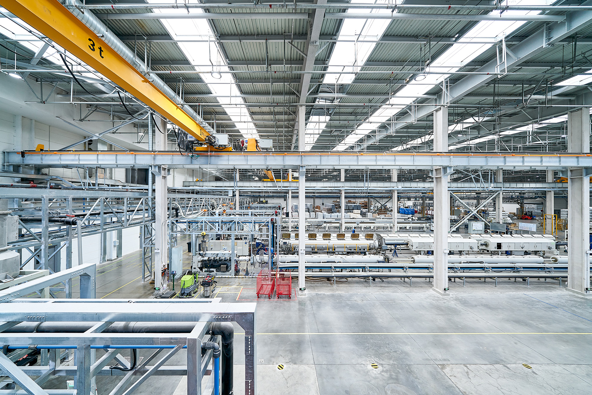 PhilippeRoy_Industrial_1685 Georg Fischer industrial architecture photography, revealing the intricate network of pipes within the factory, demonstrating precision and complexity of industrial systems.