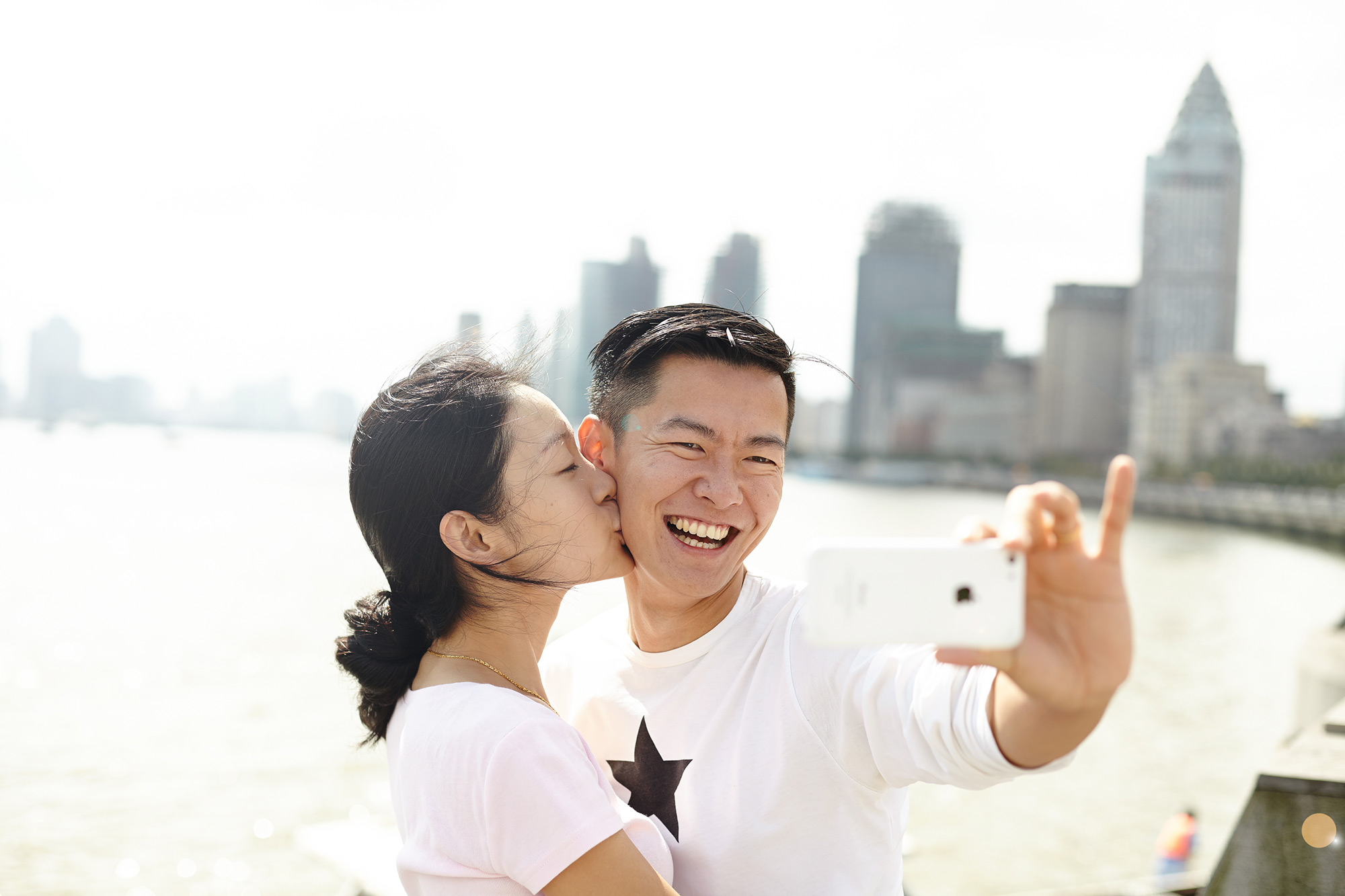 PhilippeRoy_Lifestyle_0224 Lifestyle photography of a couple relishing their time on the Bund in Shanghai, China for a Marriott Hotels and Resorts customer story.