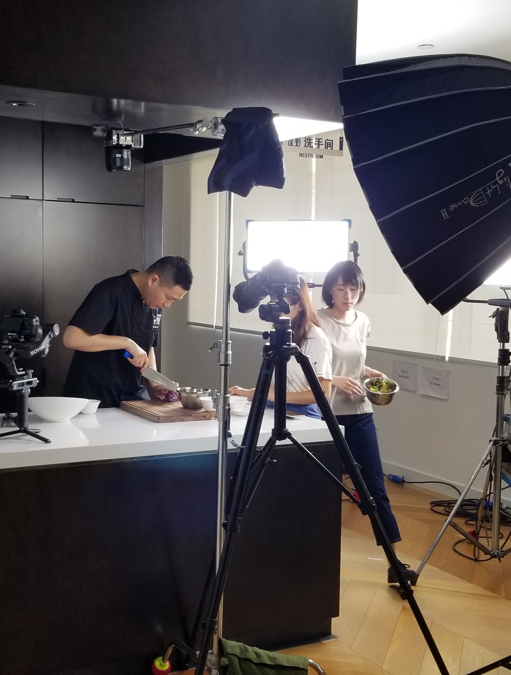 Chef preparing food in a studio setting for a professional video production