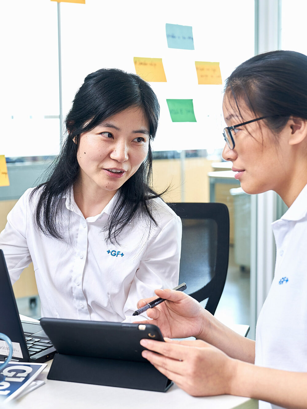 Marketing team brainstorming ideas in a corporate photography image produced for Georg Fischer.