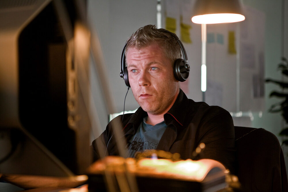 Design employee working on a computer at CPP games, captured for a corporate photography campaign showcasing work dynamics.