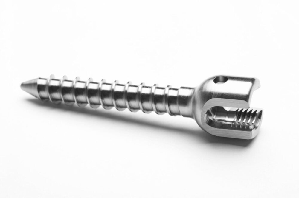 Product image showcasing a special surgical screw manufactured by DMG-Mori, featured in industrial photography project.