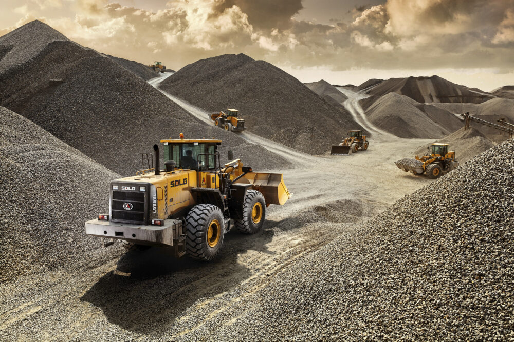 Hero image of wheel loaders on a worksite, part of SDLG's construction equipment photography.